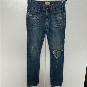Distressed Blue Jeans